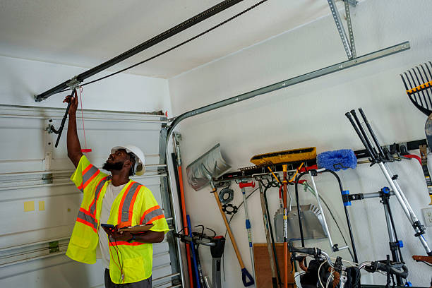 Professional Garage Door Panel Replacement technician working in Morrisville, VT